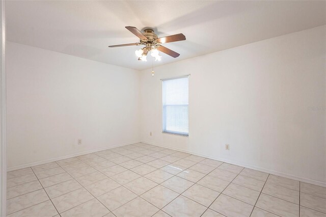 3436 Discovery Dr, Punta Gorda, FL 33983 - empty room with a ceiling fan and light tile patterned floors