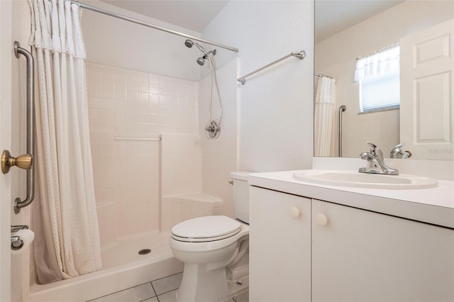 3436 Discovery Dr, Punta Gorda, FL 33983 - bathroom featuring tile patterned floors, toilet, vanity, and a stall shower