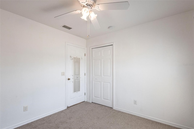 3436 Discovery Dr, Punta Gorda, FL 33983 - unfurnished room featuring light colored carpet, ceiling fan, baseboards, and visible vents