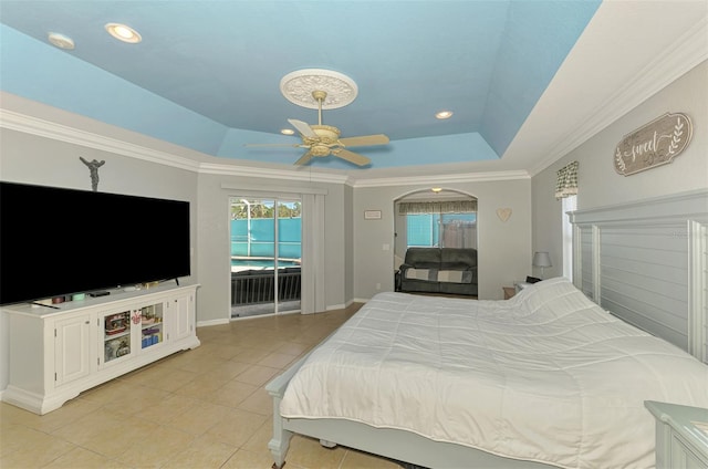 bedroom featuring baseboards, light tile patterned flooring, ceiling fan, a raised ceiling, and access to outside