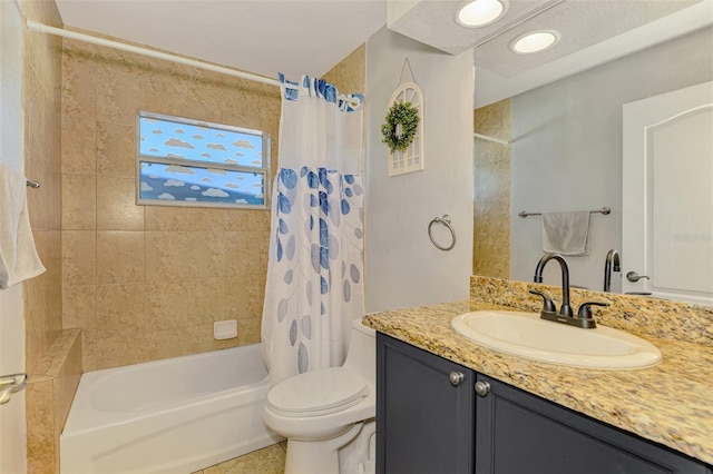 full bathroom with vanity, toilet, and shower / tub combo with curtain