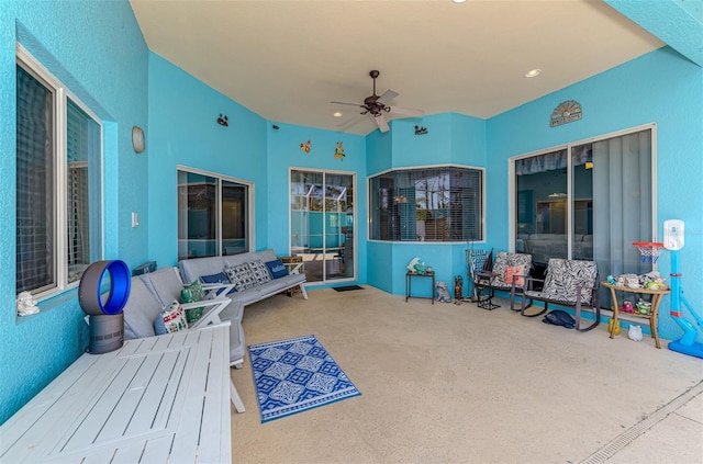 view of patio / terrace featuring a ceiling fan