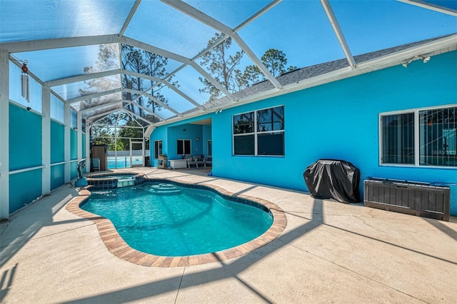 view of swimming pool featuring a lanai, area for grilling, a patio area, and a pool with connected hot tub