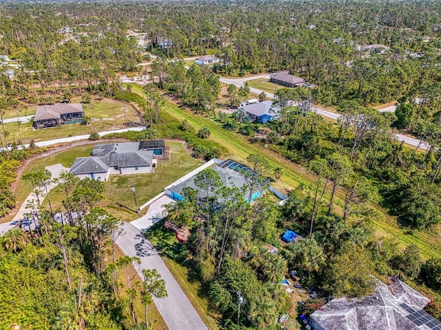 bird's eye view featuring a forest view