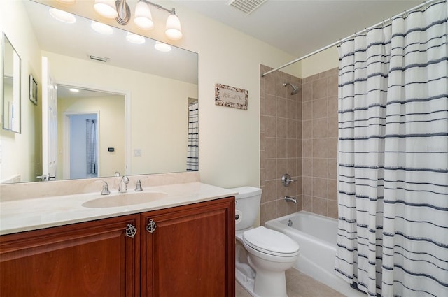 bathroom with tile patterned floors, visible vents, toilet, and shower / tub combo