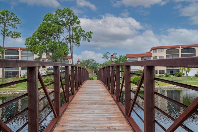 surrounding community featuring a water view