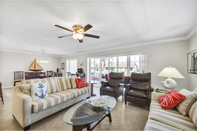 living room with ornamental molding, ceiling fan with notable chandelier, and tile patterned floors