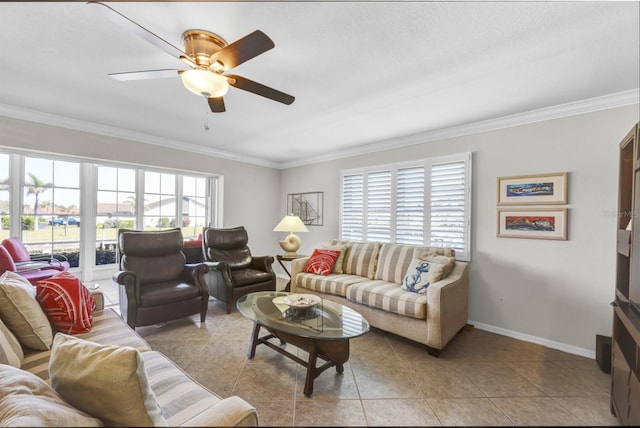 living room with a ceiling fan, baseboards, crown molding, and light tile patterned flooring