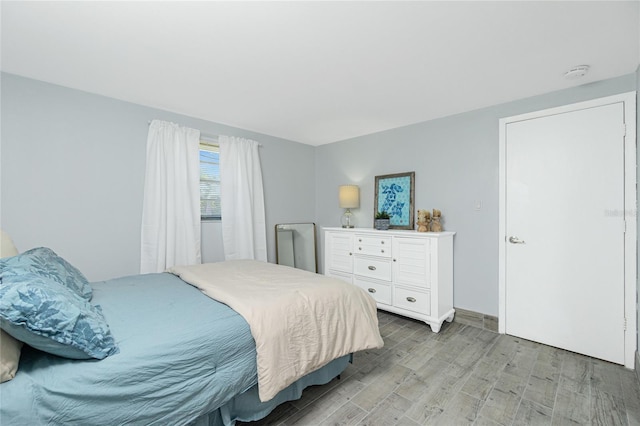 bedroom with light wood-style flooring