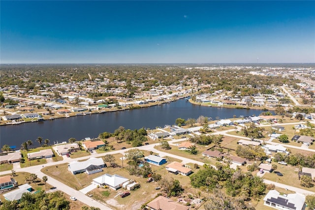 aerial view featuring a water view and a residential view