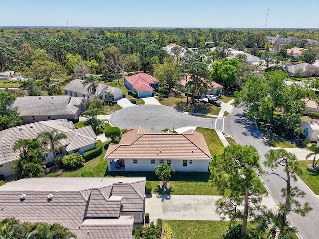 aerial view with a wooded view