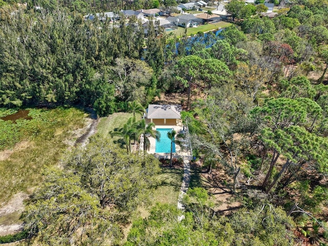 aerial view with a wooded view