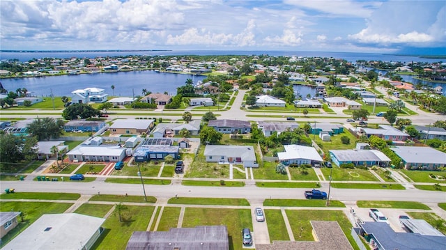 aerial view featuring a water view and a residential view