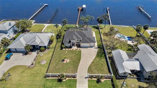 birds eye view of property with a residential view and a water view