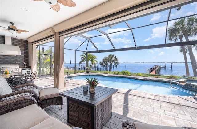 view of swimming pool featuring a water view, area for grilling, a patio, a grill, and a lanai