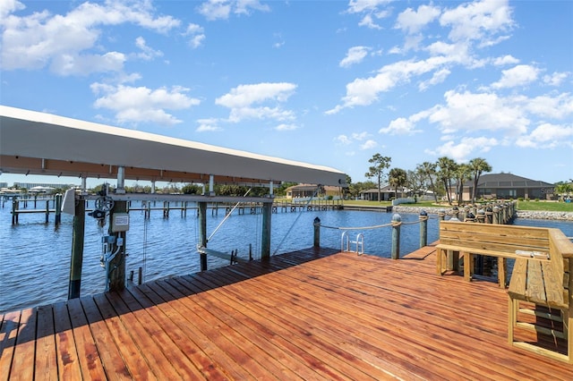 dock area with a water view