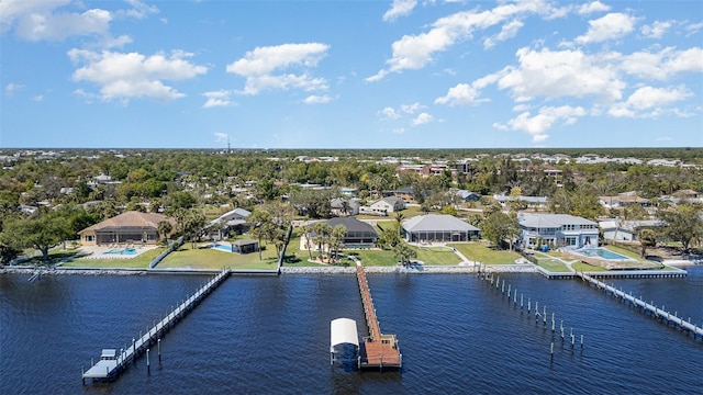 birds eye view of property with a residential view and a water view