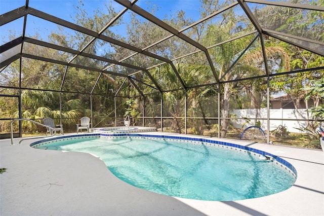 view of pool featuring a fenced in pool, a patio, an in ground hot tub, and glass enclosure