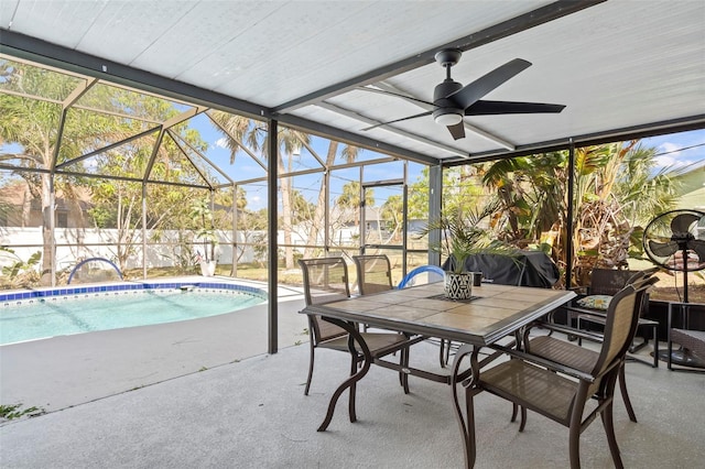 view of swimming pool with a patio area, a fenced in pool, a lanai, and fence