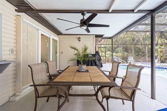 sunroom / solarium with ceiling fan