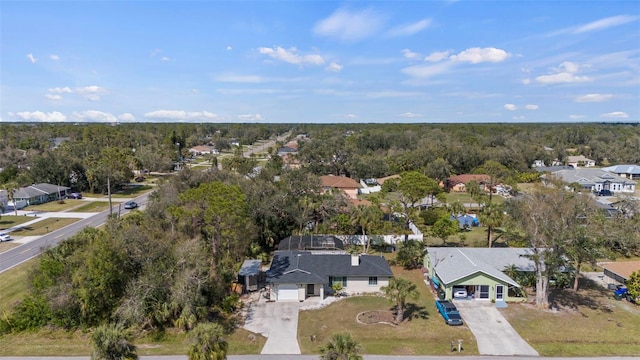 bird's eye view with a residential view and a forest view