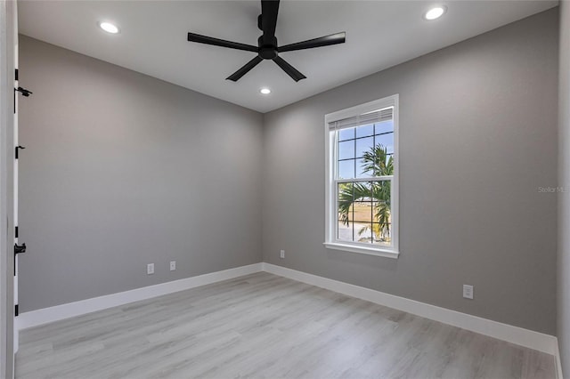 unfurnished room featuring light wood-style floors, baseboards, a ceiling fan, and recessed lighting