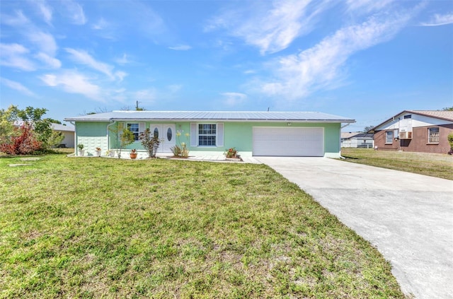 ranch-style home featuring stucco siding, an attached garage, driveway, and a front lawn