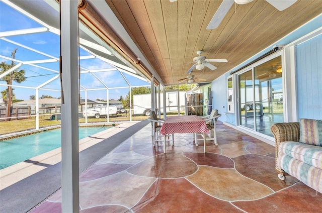 exterior space featuring wooden ceiling and a ceiling fan