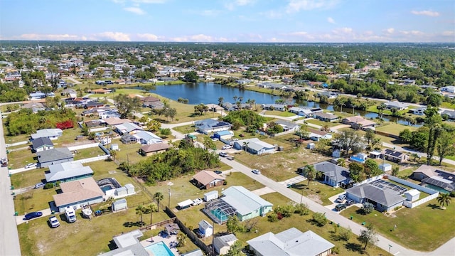 bird's eye view featuring a residential view and a water view