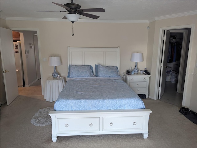 unfurnished bedroom featuring light colored carpet, freestanding refrigerator, ceiling fan, and ornamental molding