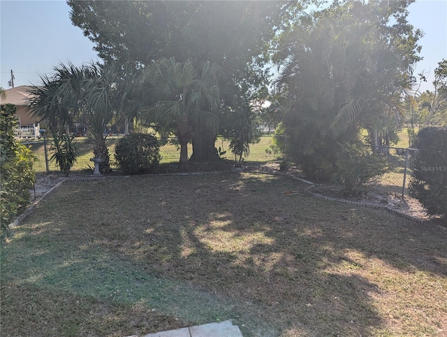 view of yard featuring fence