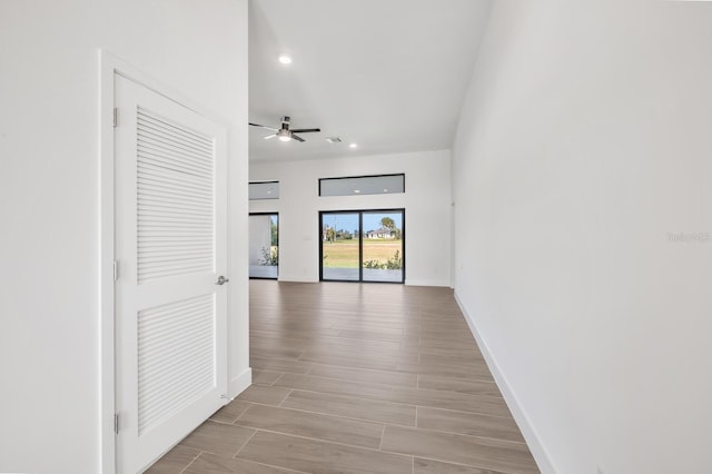 17261 Naiad Ct, Punta Gorda, FL 33955 - hall with baseboards, recessed lighting, and light wood-type flooring