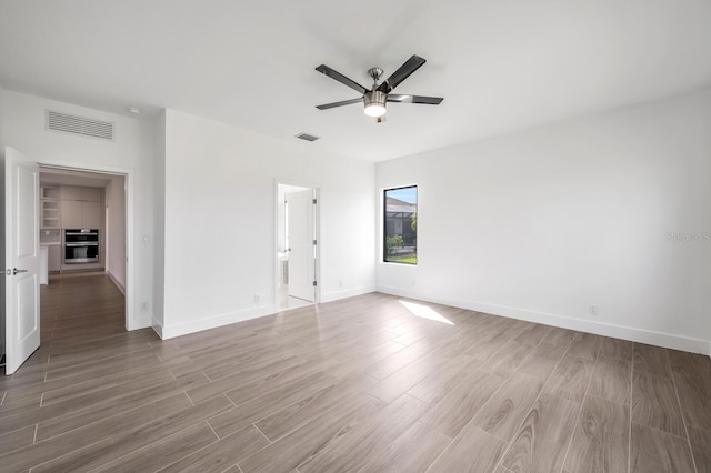 17261 Naiad Ct, Punta Gorda, FL 33955 - unfurnished bedroom with light wood finished floors, baseboards, and a ceiling fan