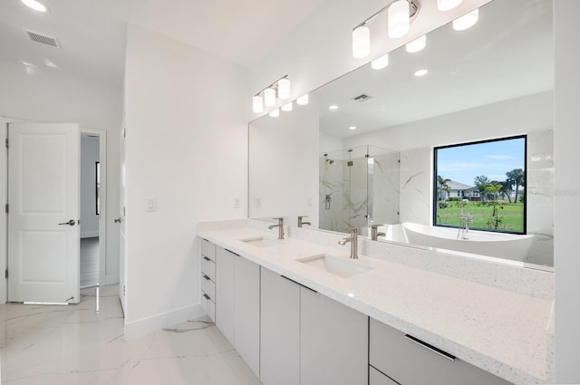 17261 Naiad Ct, Punta Gorda, FL 33955 - full bathroom featuring a marble finish shower, double vanity, baseboards, marble finish flooring, and recessed lighting