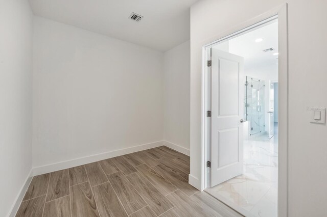 17261 Naiad Ct, Punta Gorda, FL 33955 - empty room featuring wood finish floors and baseboards