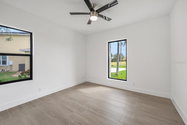 17261 Naiad Ct, Punta Gorda, FL 33955 - unfurnished room featuring baseboards, a ceiling fan, and wood finished floors