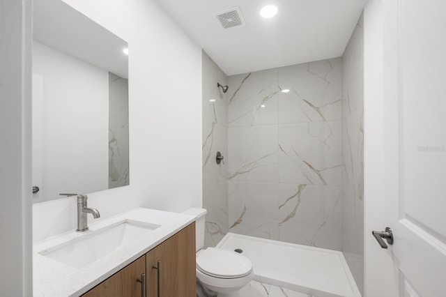 17261 Naiad Ct, Punta Gorda, FL 33955 - full bathroom featuring toilet, a marble finish shower, vanity, and recessed lighting