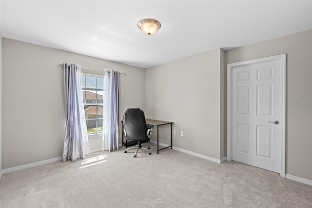 office area with baseboards and carpet