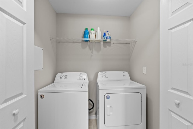 laundry room featuring washer and clothes dryer