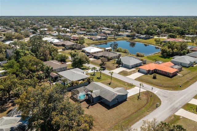 bird's eye view featuring a residential view and a water view