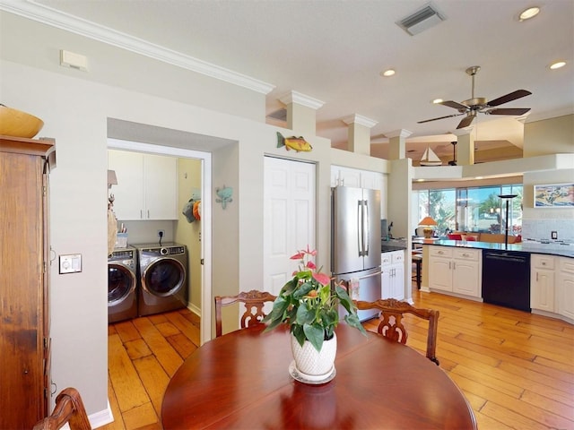 dining space with visible vents, independent washer and dryer, ornamental molding, recessed lighting, and light wood finished floors