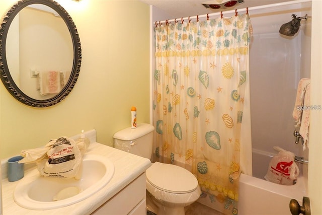 bathroom featuring shower / tub combo, toilet, and vanity