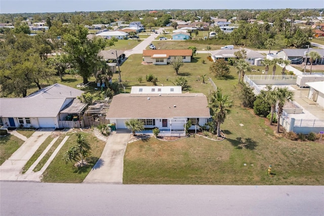 birds eye view of property with a residential view