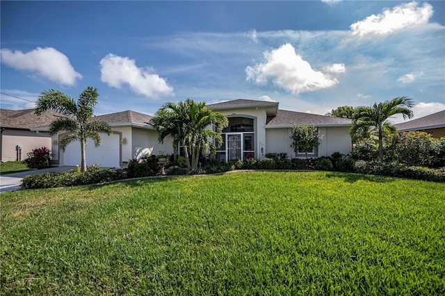 view of front of property featuring stucco siding, an attached garage, driveway, and a front lawn