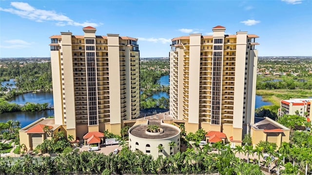 view of building exterior featuring a water view