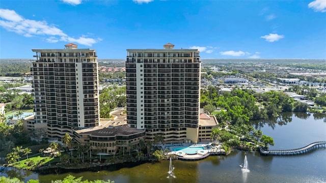 birds eye view of property featuring a water view