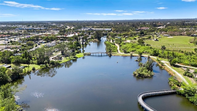 birds eye view of property featuring a water view