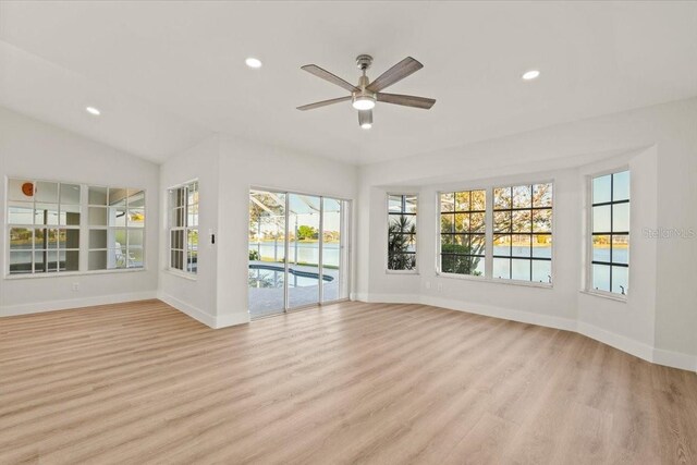 12800 SW Pembroke Cir N, Lake Suzy, FL 34269 - empty room with baseboards, light wood-type flooring, a ceiling fan, and recessed lighting