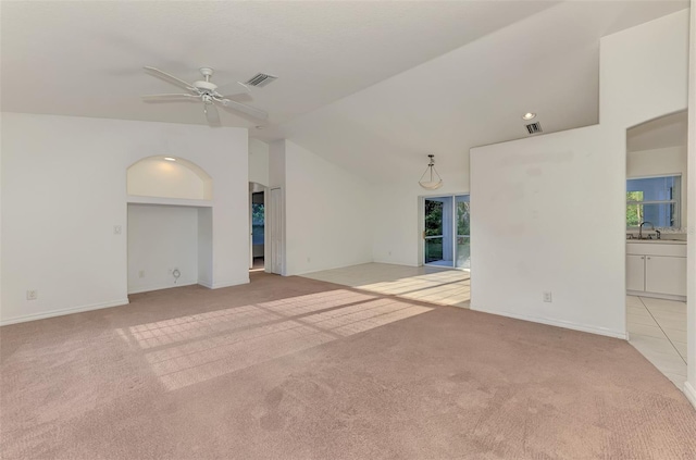 unfurnished room featuring ceiling fan, visible vents, and light carpet