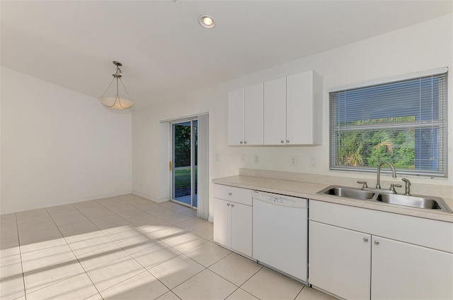 kitchen with decorative light fixtures, dishwasher, light countertops, white cabinetry, and a sink